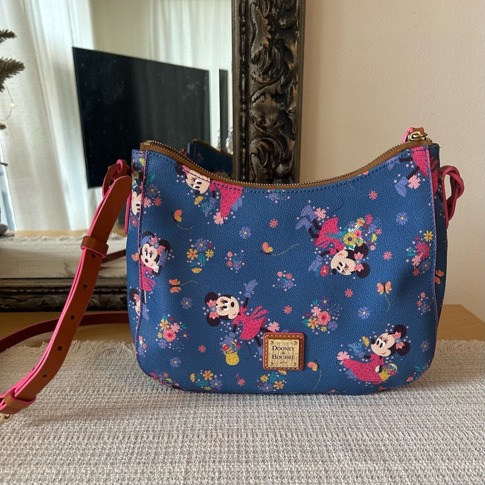 Disney Dooney and Bourke Minnie Epcot Flower and Garden crossbody.